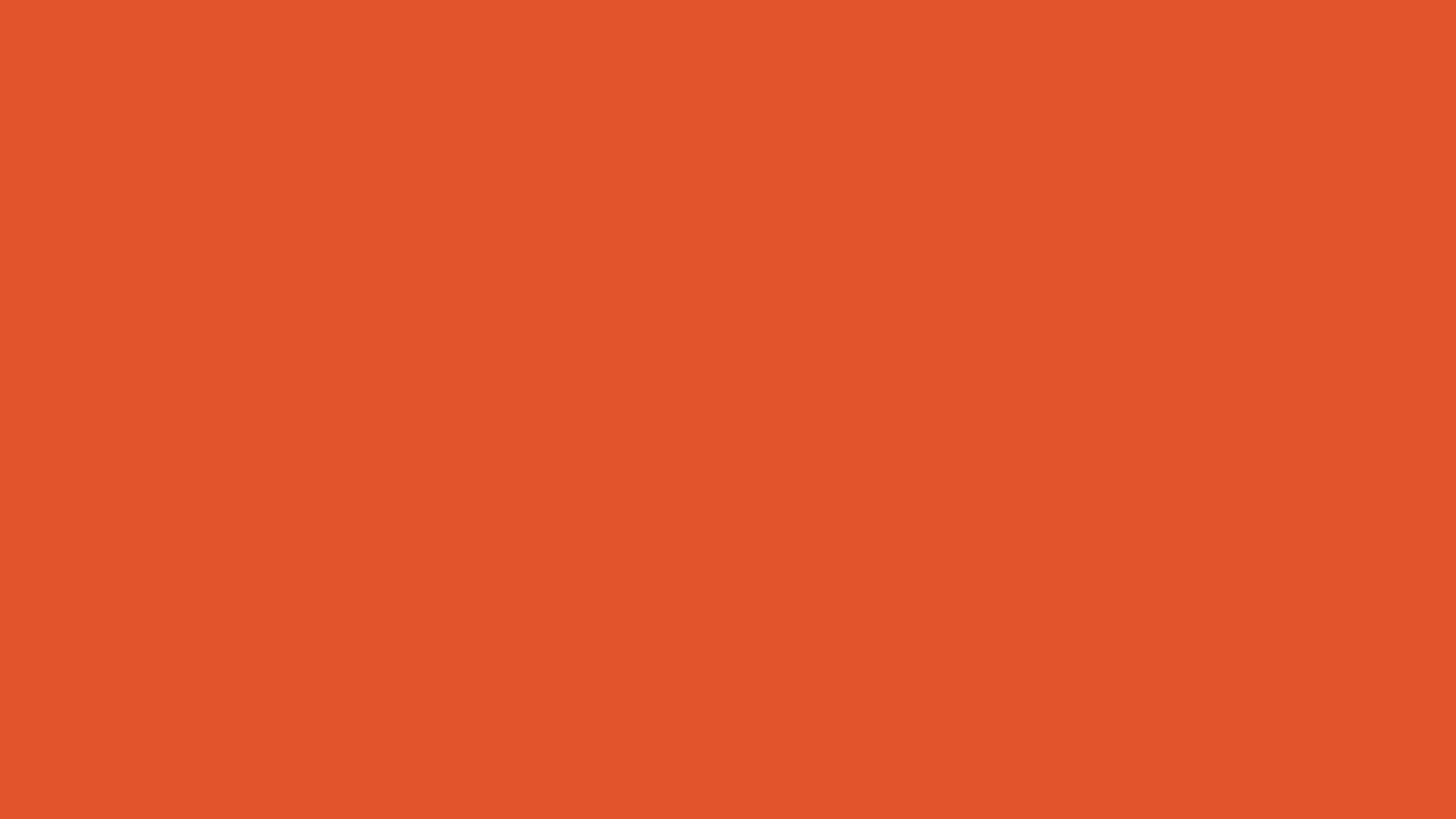 Download a free high-resolution solid color background image of Pantone 17-1461 Tcx Orangeade Color | Hex color Code #e2552c. Ideal for wallpapers, presentations, and digital art. #solidcolor #backgroundimage #color #e2552c