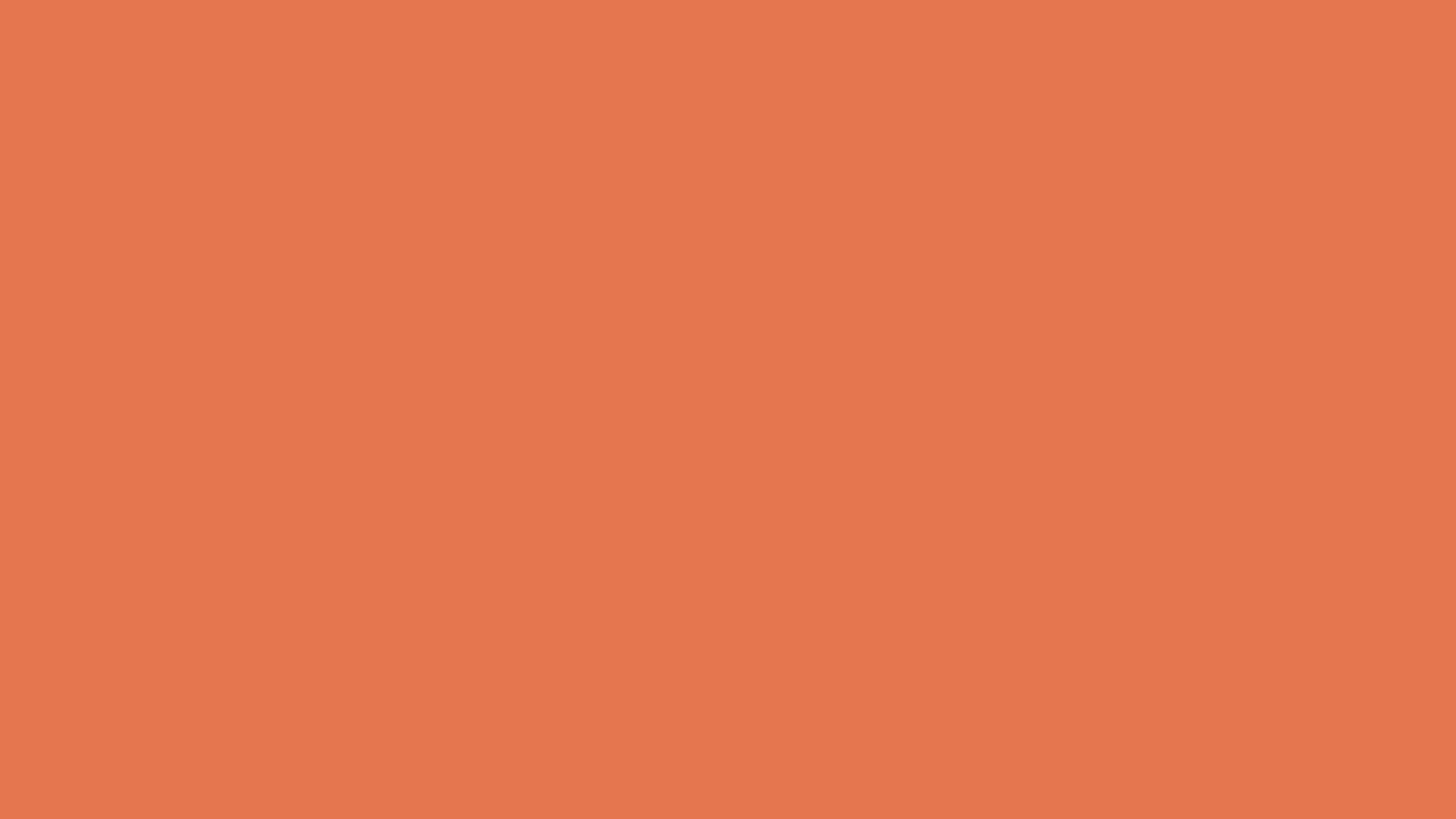 Download a free high-resolution solid color background image of Pantone Orange 021 UP Color | Hex color Code #e5764f. Ideal for wallpapers, presentations, and digital art. #solidcolor #backgroundimage #color #e5764f